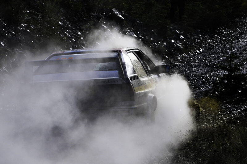Rally car kicking up dust