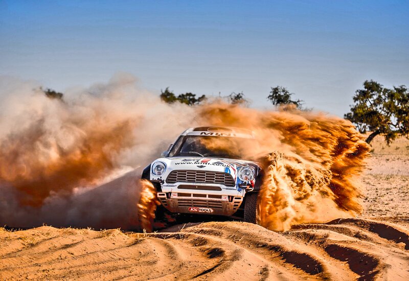 Rally Car Kicking Up Dust — Brown, Dynamic, Afternoon, Photograph, Dust Cloud, Sandy Terrain
