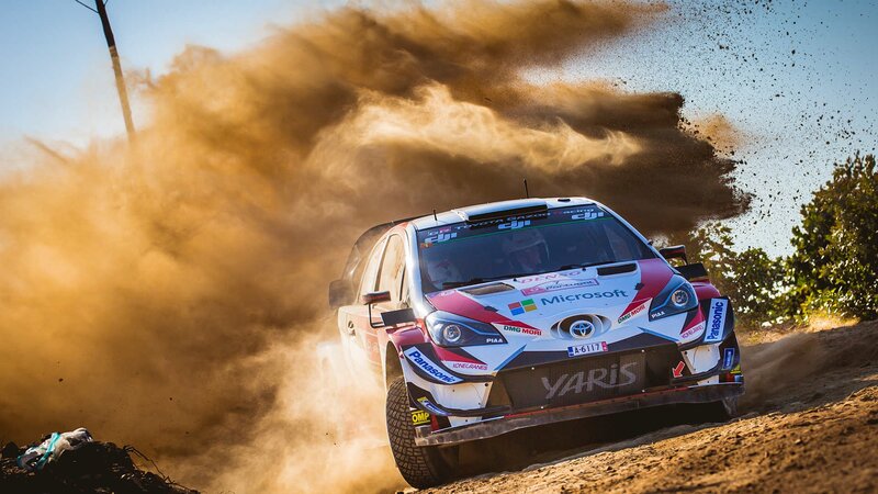 Rally Car Kicking Up Dust — Brown, Dynamic, Afternoon, Photograph, Dust Cloud, Trees