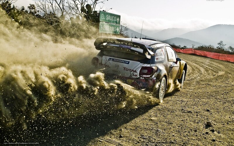 Rally Car Kicking Up Dust — Brown, Dynamic, Afternoon