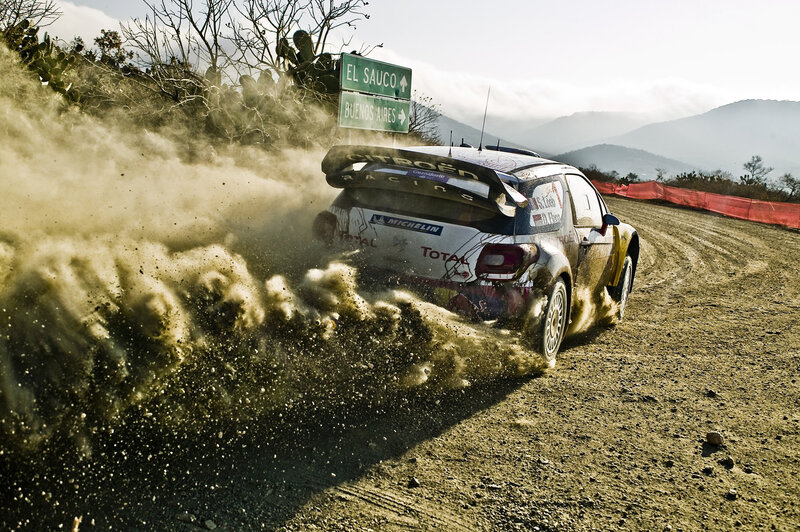 Rally Car Kicking Up Dust — Brown