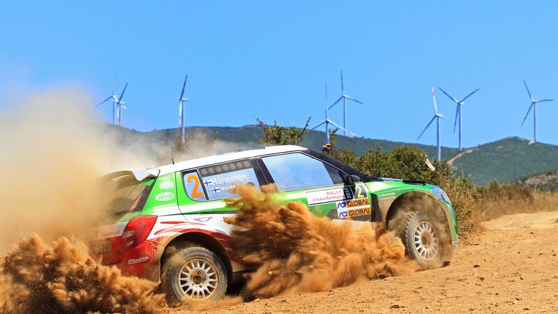 Rally Car Kicking Up Dust — Green