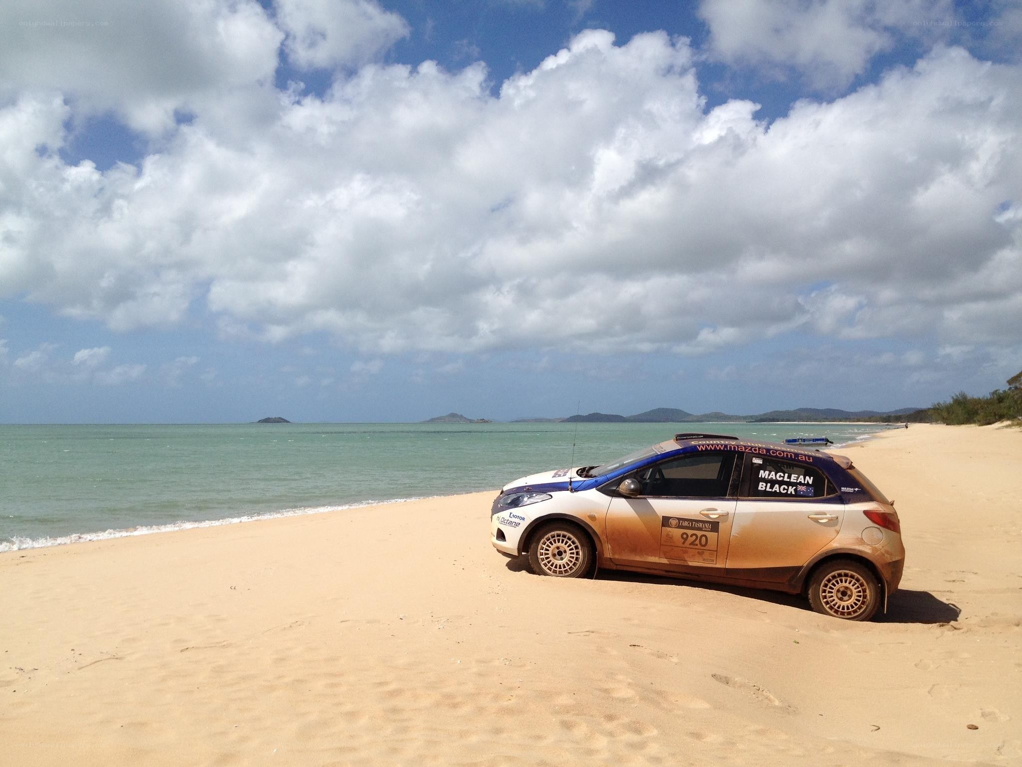 Rally car on a sandy beach