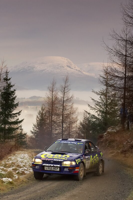 Rally car on a snowy mountain road