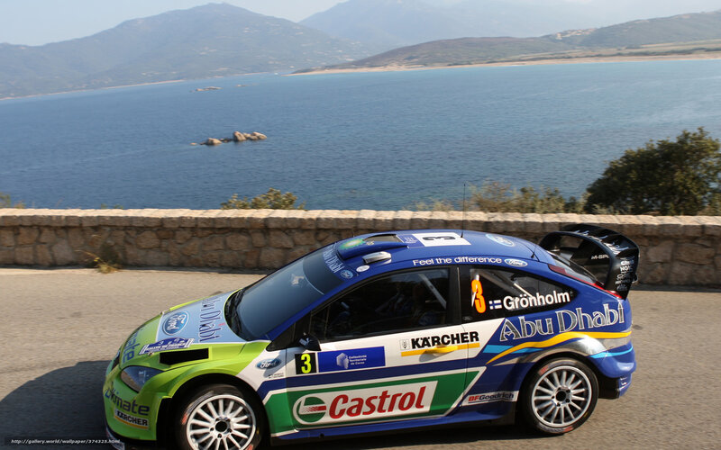 Rally Car on Coastal Road — Blue