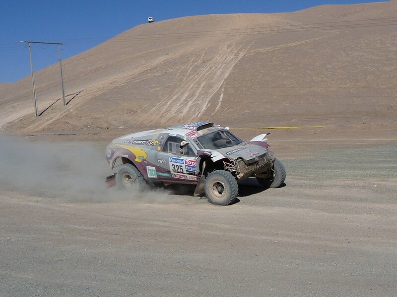 Rally Car on Dirt — Brown, Dusty