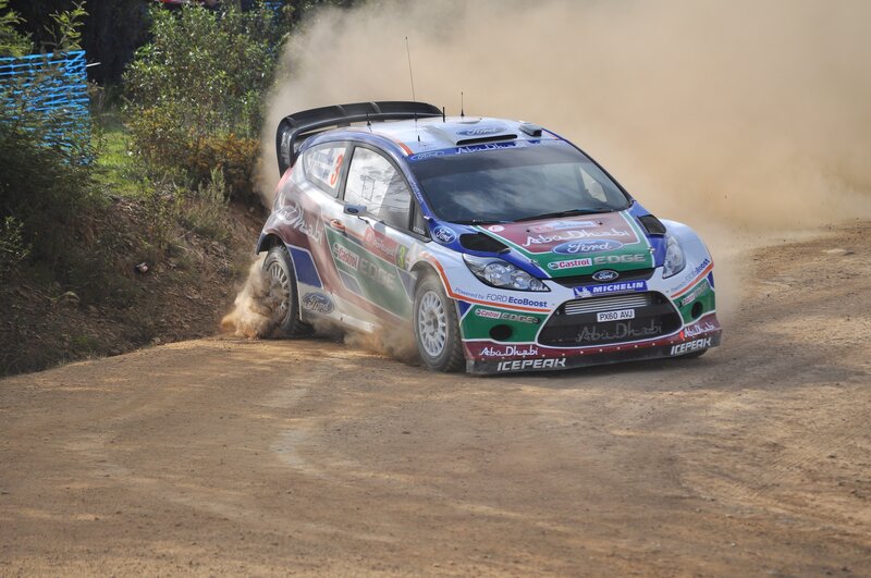 Rally Car on Dirt — Brown, Dynamic, Afternoon, Photograph, Dirt Road, Dust Cloud