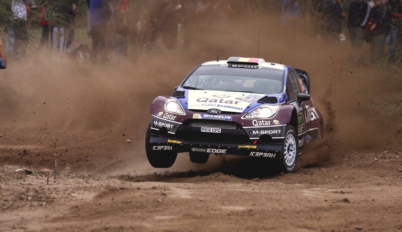 Rally Car on Dirt — Brown, Dynamic, Afternoon, Photograph, Dirt Track, Spectators, Dust