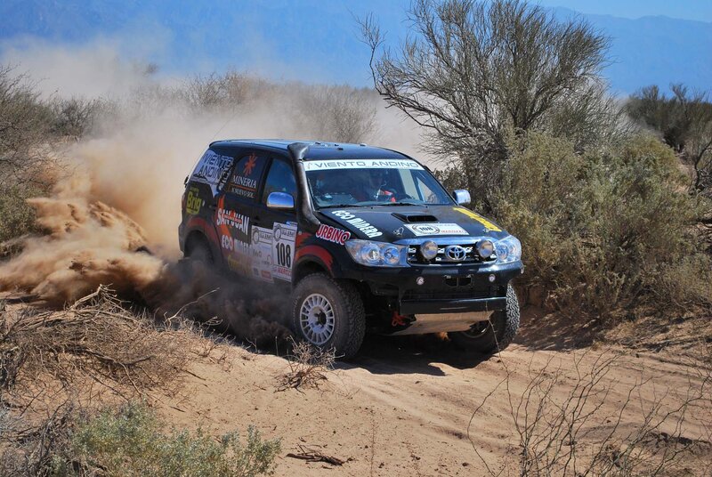 Rally Car on Dirt — Brown, Dynamic, Afternoon, Photograph, Dust