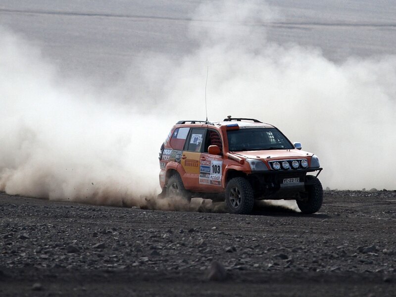 Rally Car on Dirt — Orange, Dynamic