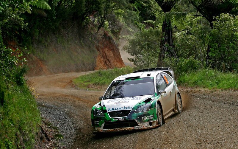 Rally car on dirt road