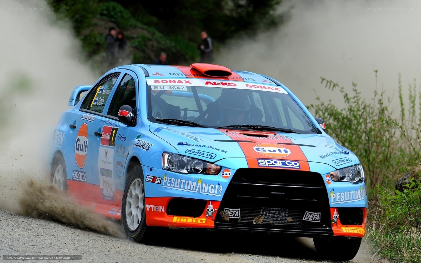 rally car on dirt road