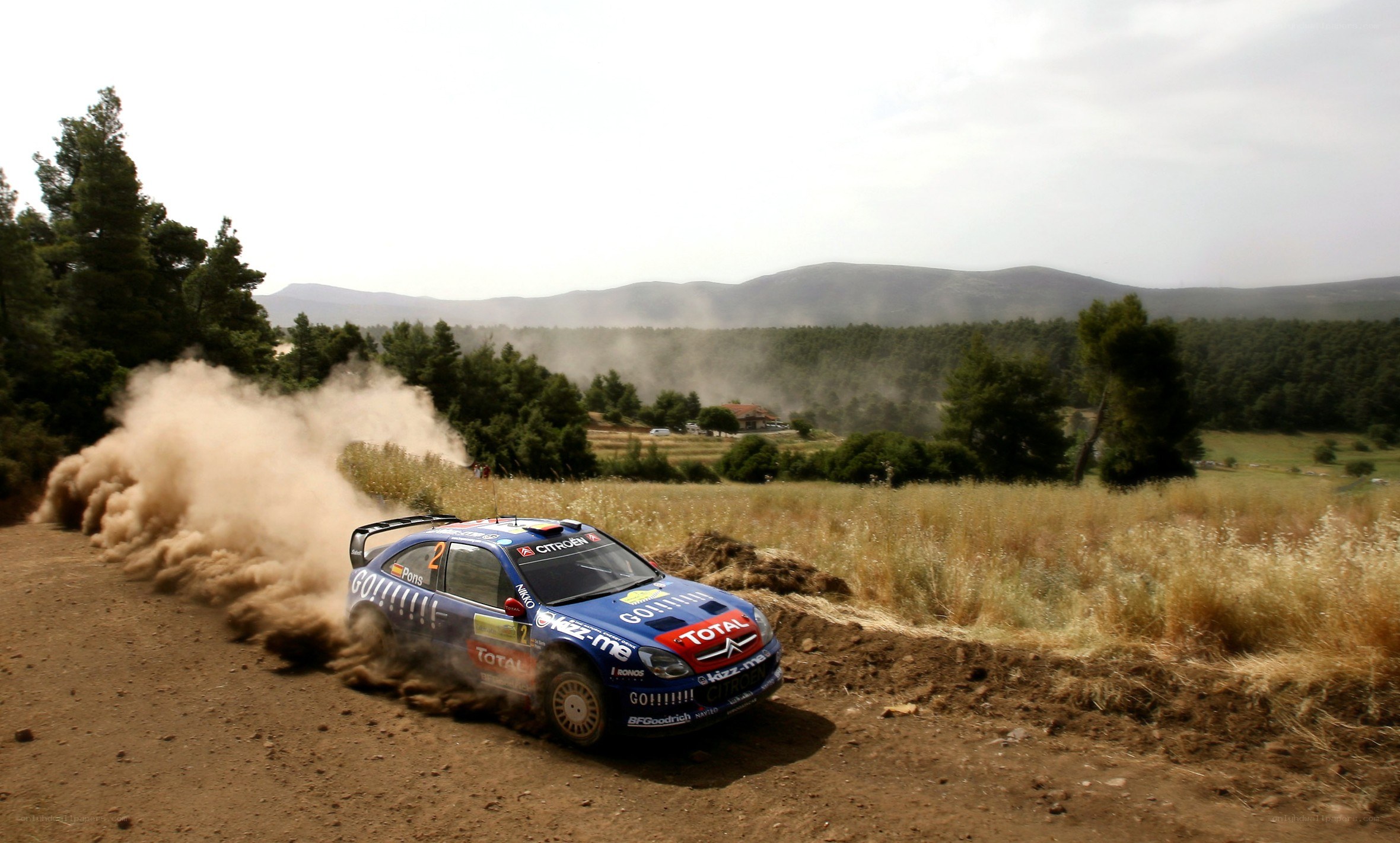 Rally car on dirt road