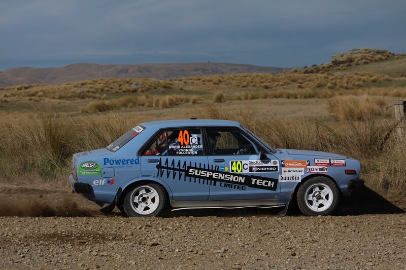 rally car on dirt road