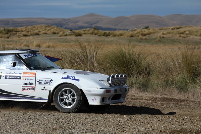 rally car on dirt road