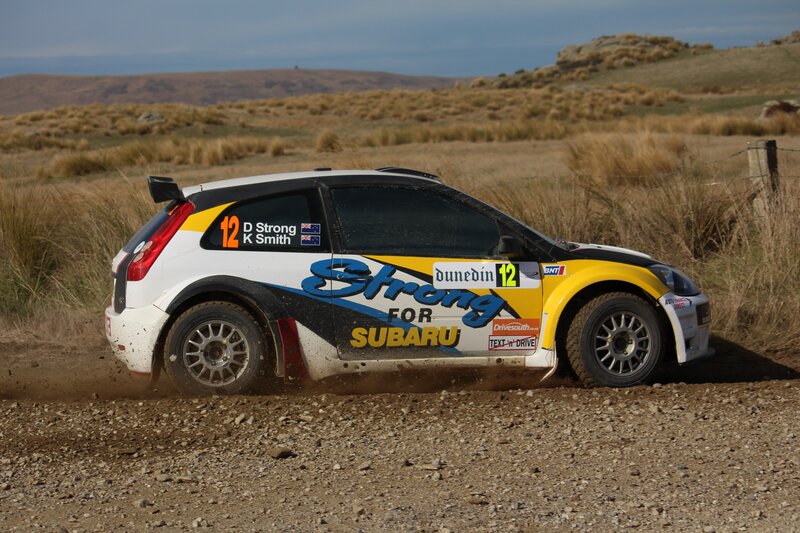 Rally car on dirt road