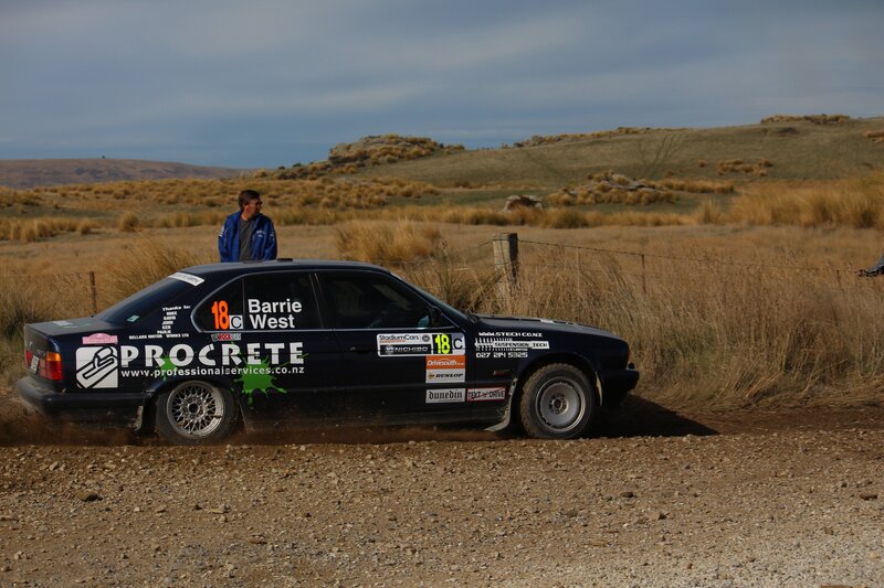 rally car on dirt road