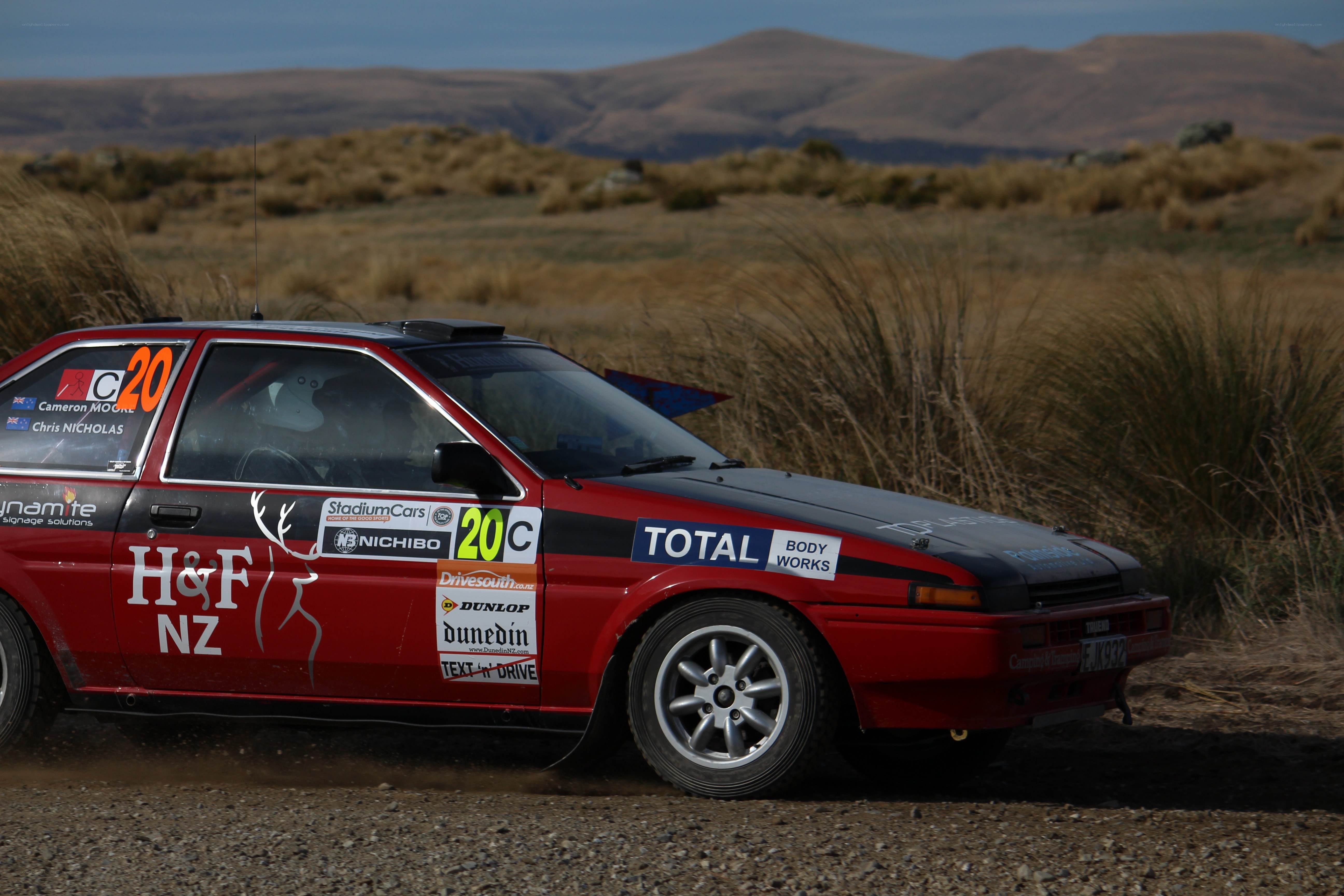 rally car on dirt road