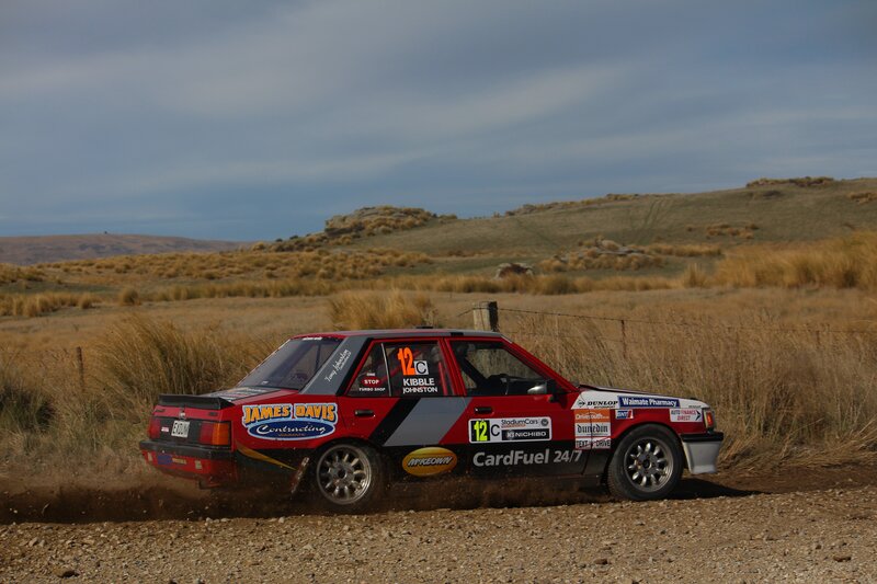 Rally car on dirt road