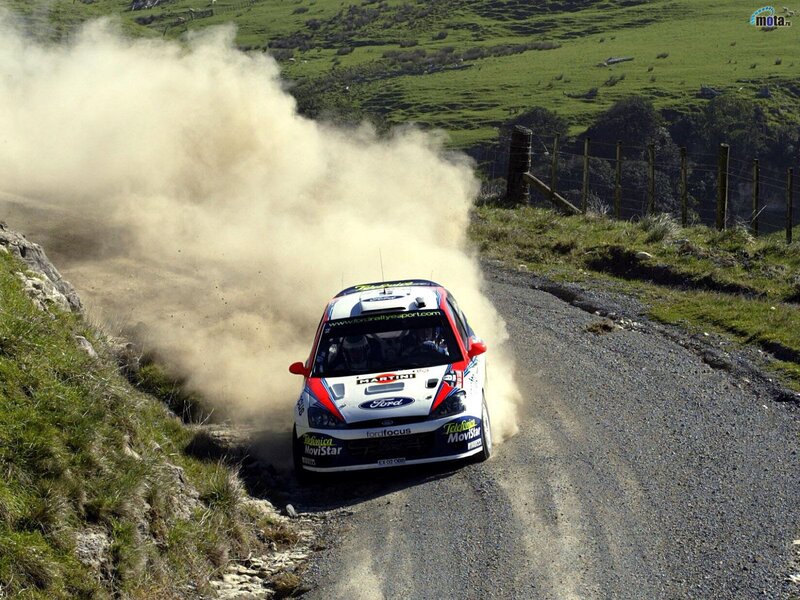 rally car on dirt road