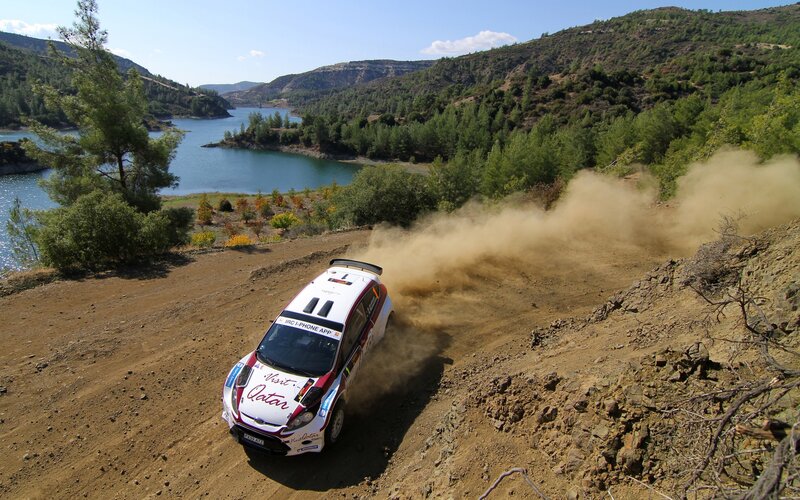 Rally car on dirt road