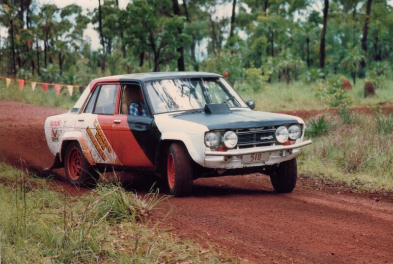 rally car on dirt road