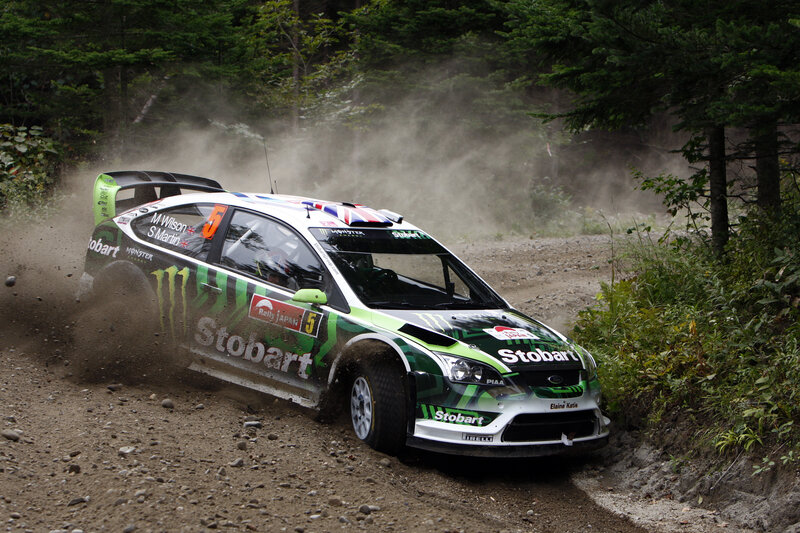 Rally car on dirt road