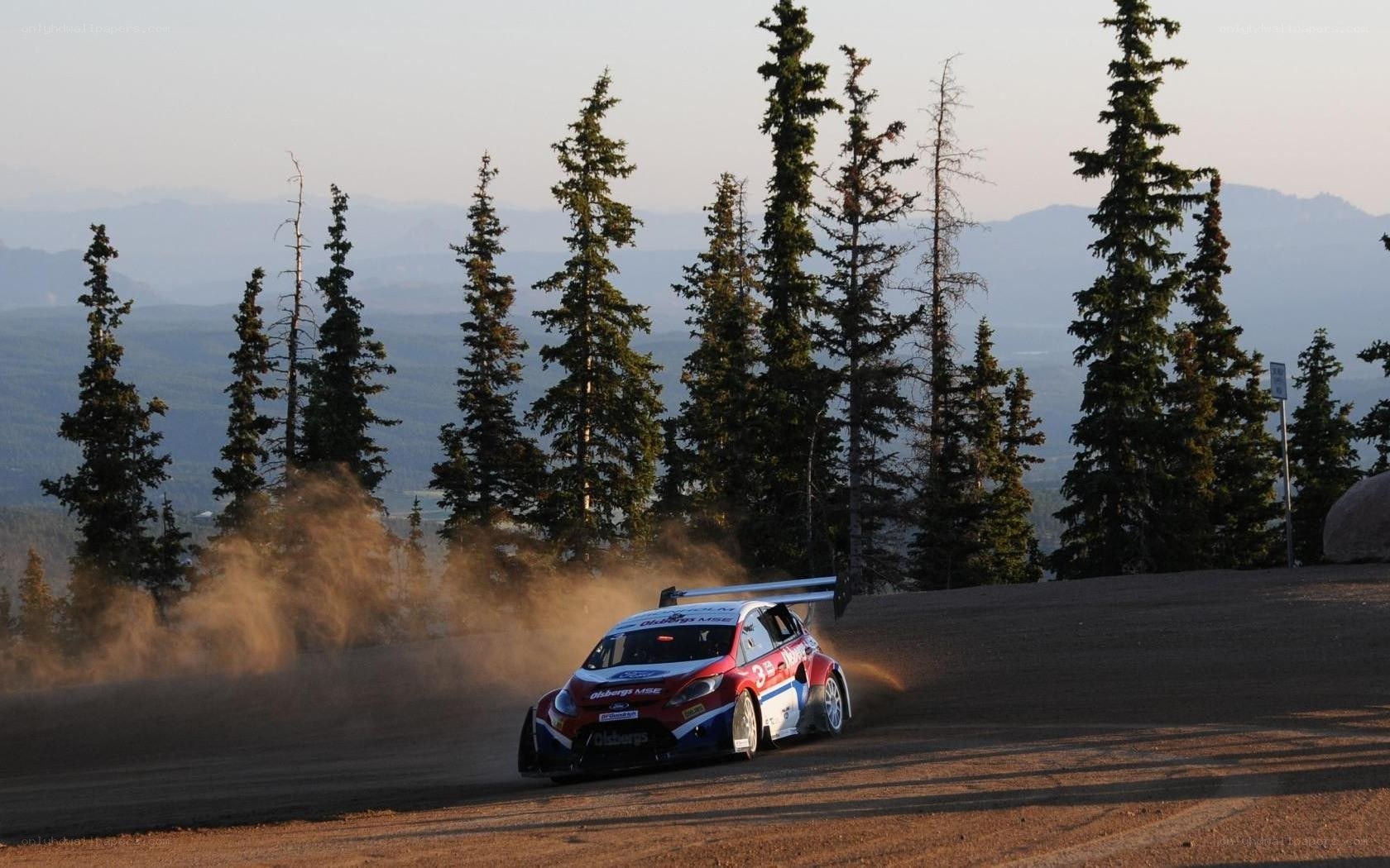 rally car on dirt road