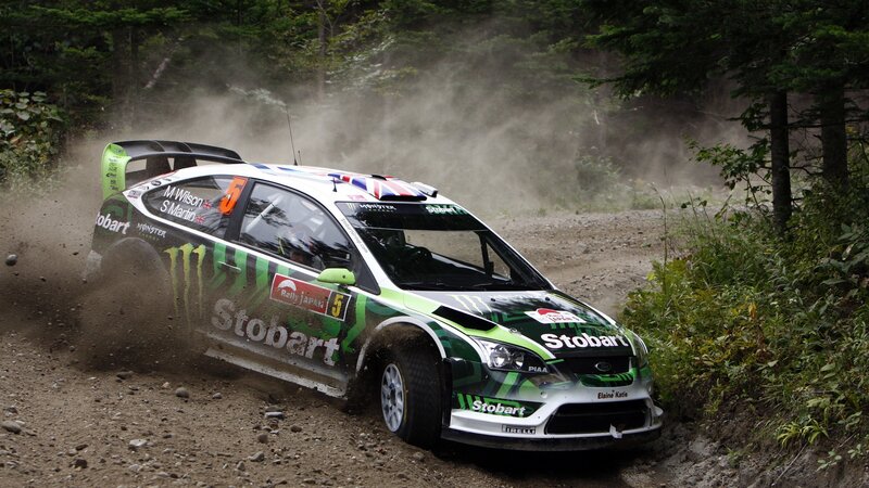 Rally car on dirt road