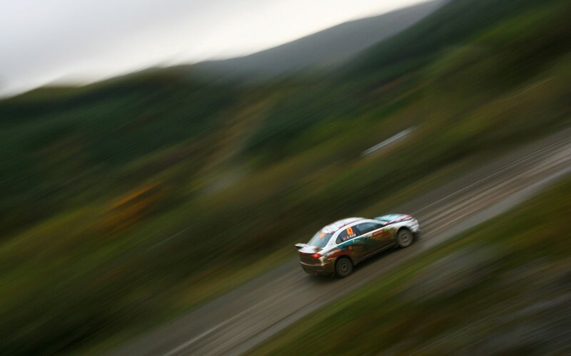 rally car on dirt road