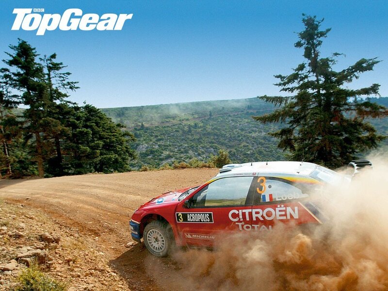 Rally car on dirt road