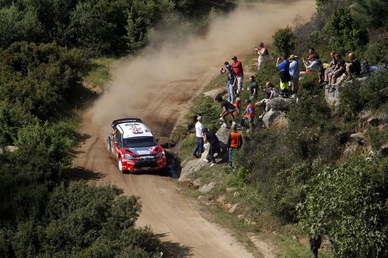 Rally car on dirt road