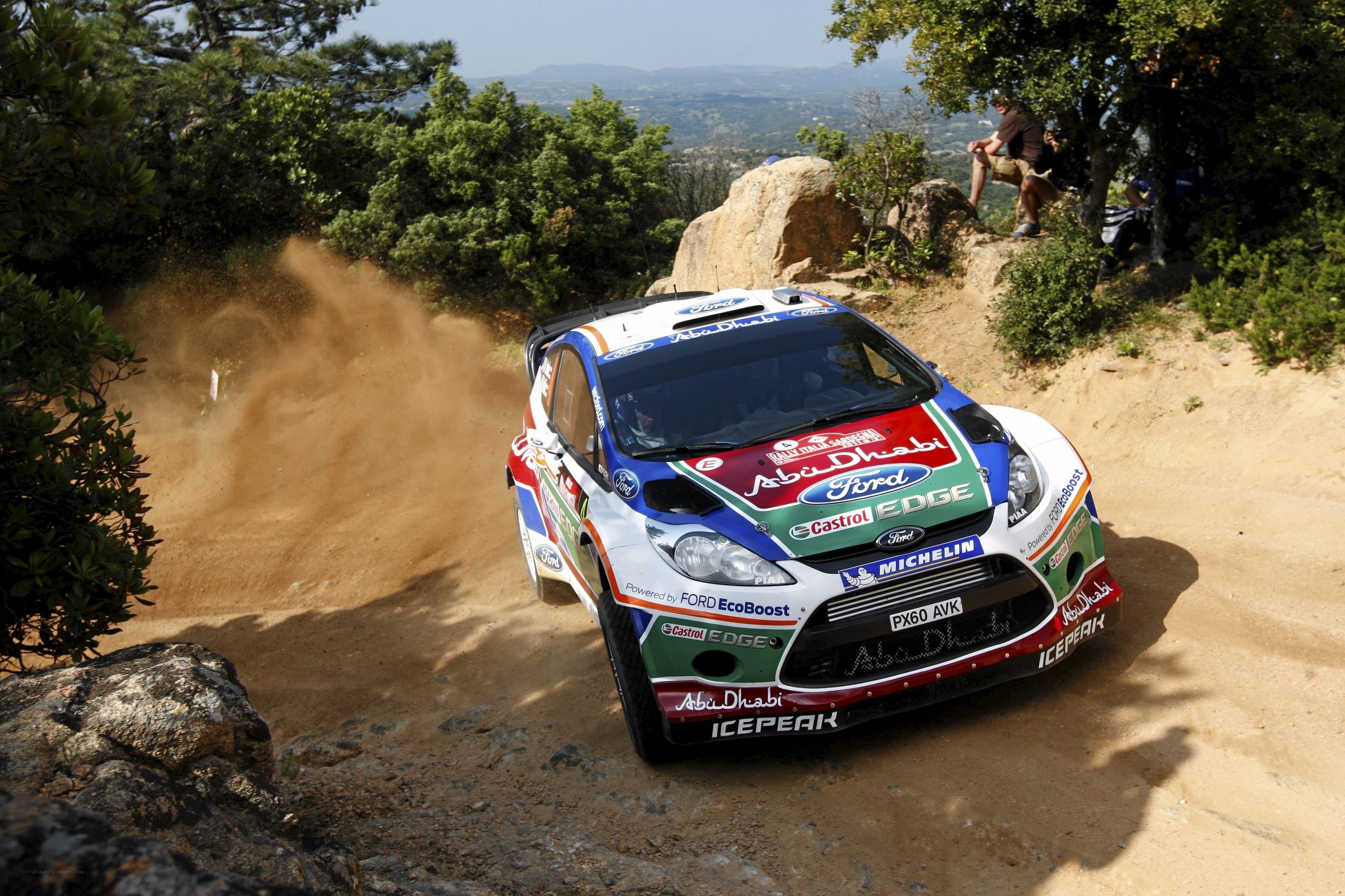 Rally car on dirt road