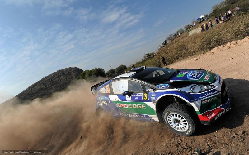 Rally Car on Dirt Road — Blue, Dynamic, Afternoon, Photograph, Dust Cloud, Spectators