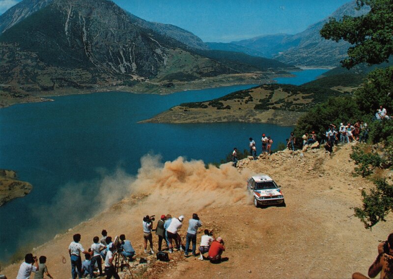 Rally Car on Dirt Road — Blue, Dynamic, Afternoon, Photograph, Dust