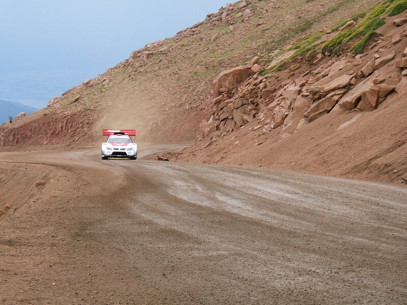Rally Car on Dirt Road — Brown, Dynamic, Afternoon, Photograph, Dirt Road, Mountain Slope