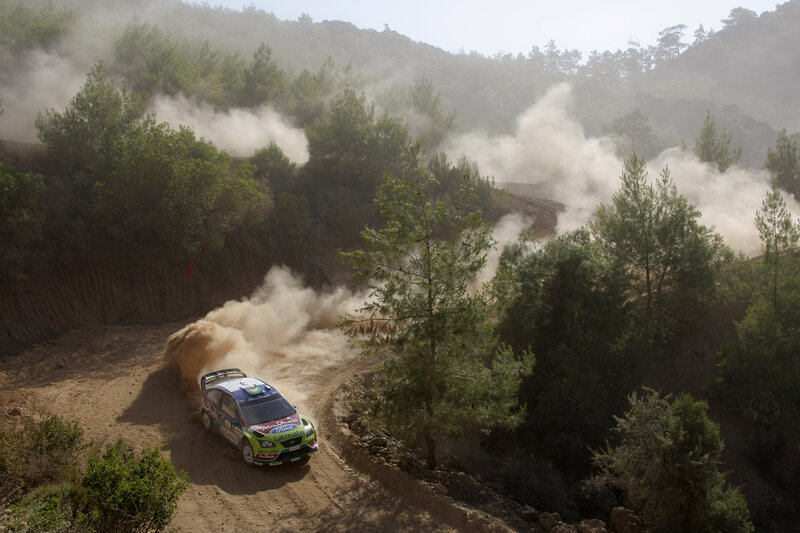 Rally Car on Dirt Road — Brown, Dynamic, Afternoon, Photograph, Dirt Road, Trees, Dust, Green
