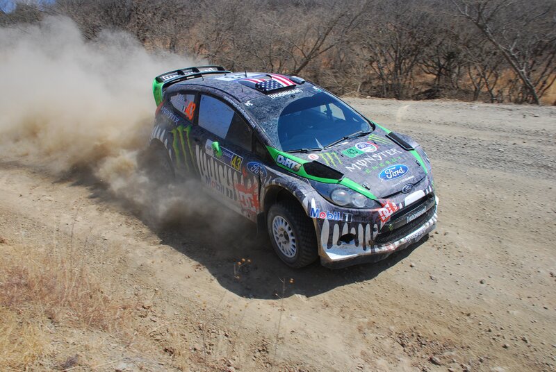 Rally Car on Dirt Road — Brown, Dynamic, Afternoon, Photograph, Trees