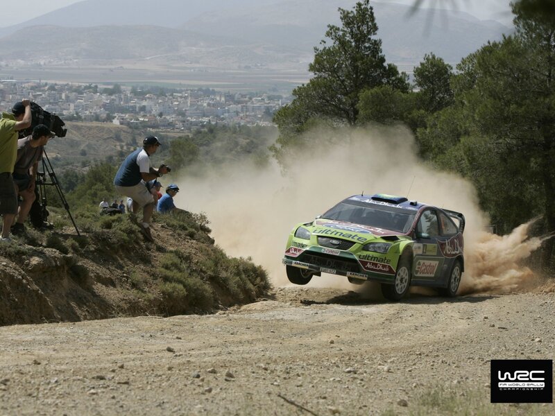 Rally Car on Dirt Road — Green, Dynamic, Afternoon, Photograph, Dust Cloud