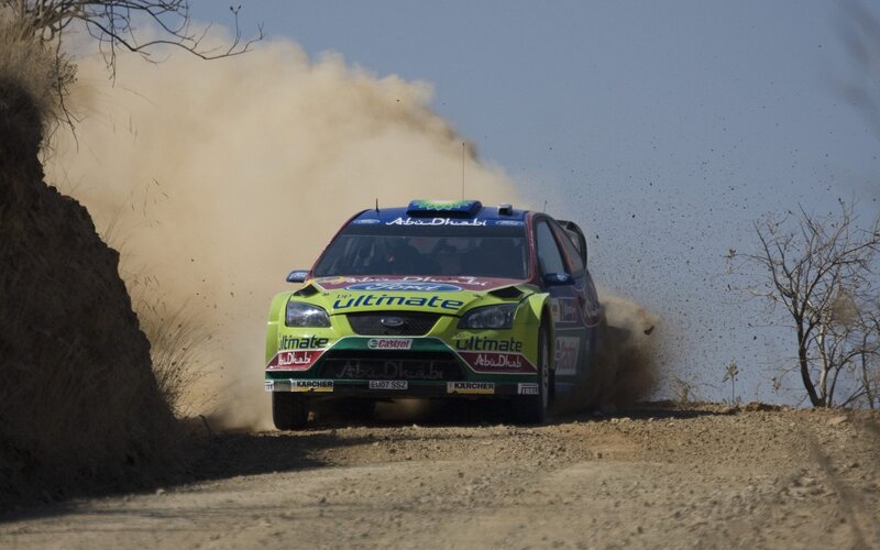 Rally Car on Dirt Road — Green, Dynamic, Afternoon, Photograph, Dust Cloud, Tree