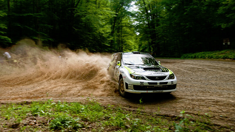 Rally Car on Dirt Road — Green, Dynamic, Afternoon, Photograph, Trees, Dust, Brown