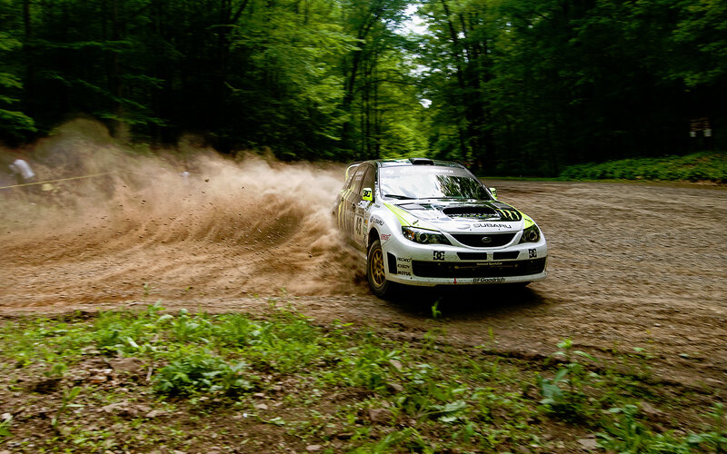 Rally Car on Dirt Road — Green, Dynamic, Afternoon, Photograph, Trees, Dust