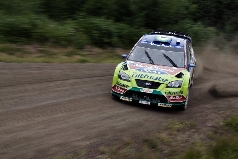 Rally Car on Dirt Road — Green, Dynamic, Photograph, Dirt Road, Trees
