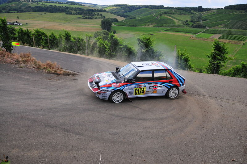Rally Car on Dirt Road — White, Dynamic, Afternoon, Photograph, Dirt Road