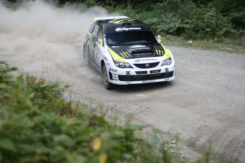 Rally Car on Dirt Road — White, Dynamic, Afternoon, Photograph, Dust, Trees