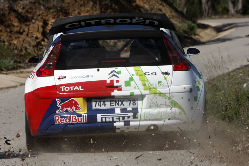 Rally Car on Dirt Road — White, Dynamic, Afternoon