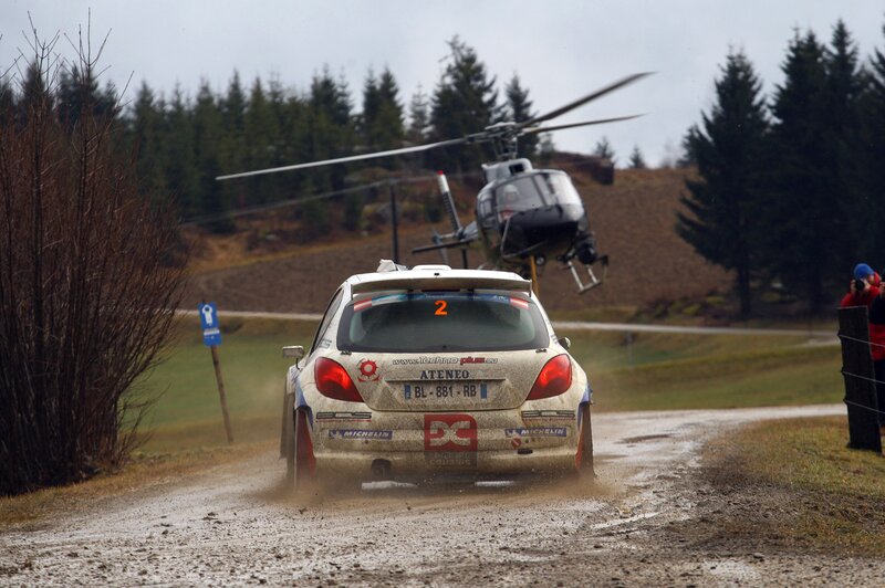 Rally Car on Dirt Road — White, Dynamic, Autumn, Photograph, Helicopter