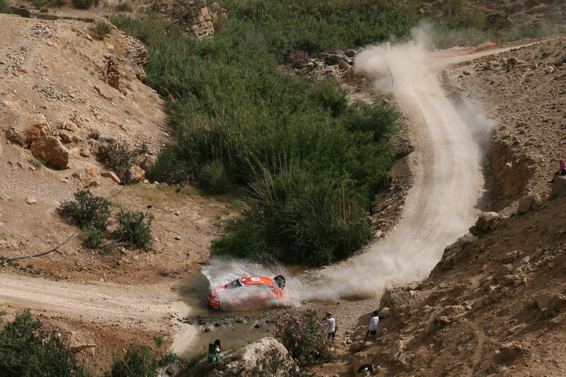 Rally car on dirt track