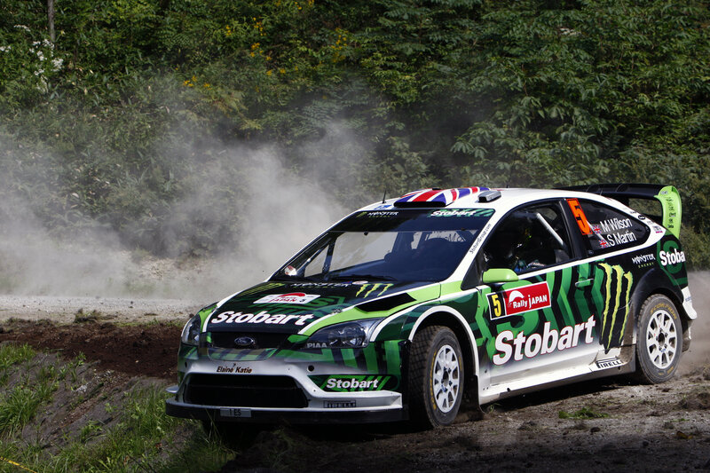 Rally car on dirt track