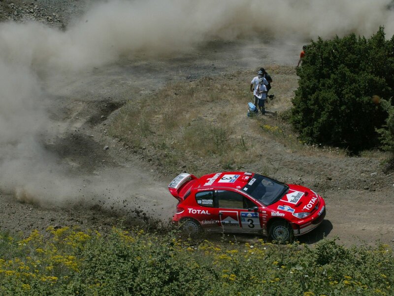 Rally car on dirt track